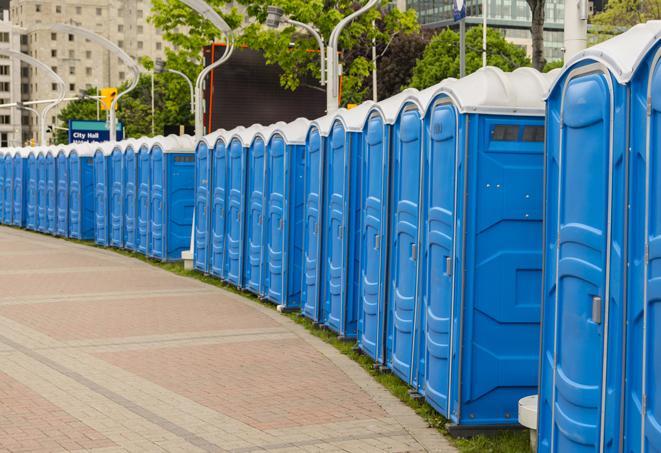 a row of portable restrooms at a fairground, offering visitors a clean and hassle-free experience in sycamore